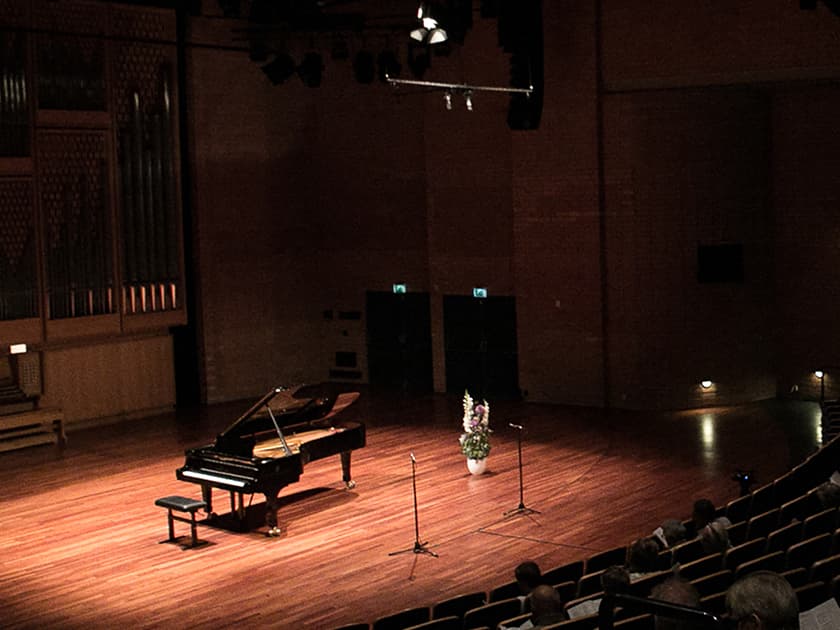 Grand Piano on a stage. Photo by Camilla Storvollen